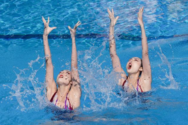 开云官网-首金!双胞胎姐妹强势夺冠 中国花游新周期仍给力